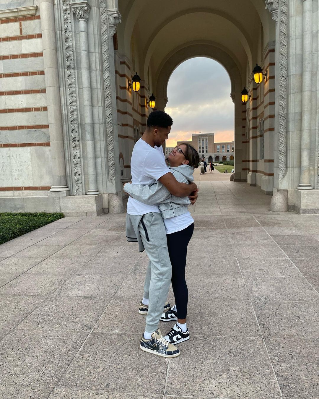 Giannis Antetokounpo and Mariah Riddlesprigger