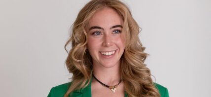 Grace Charis goes braless under green blazer