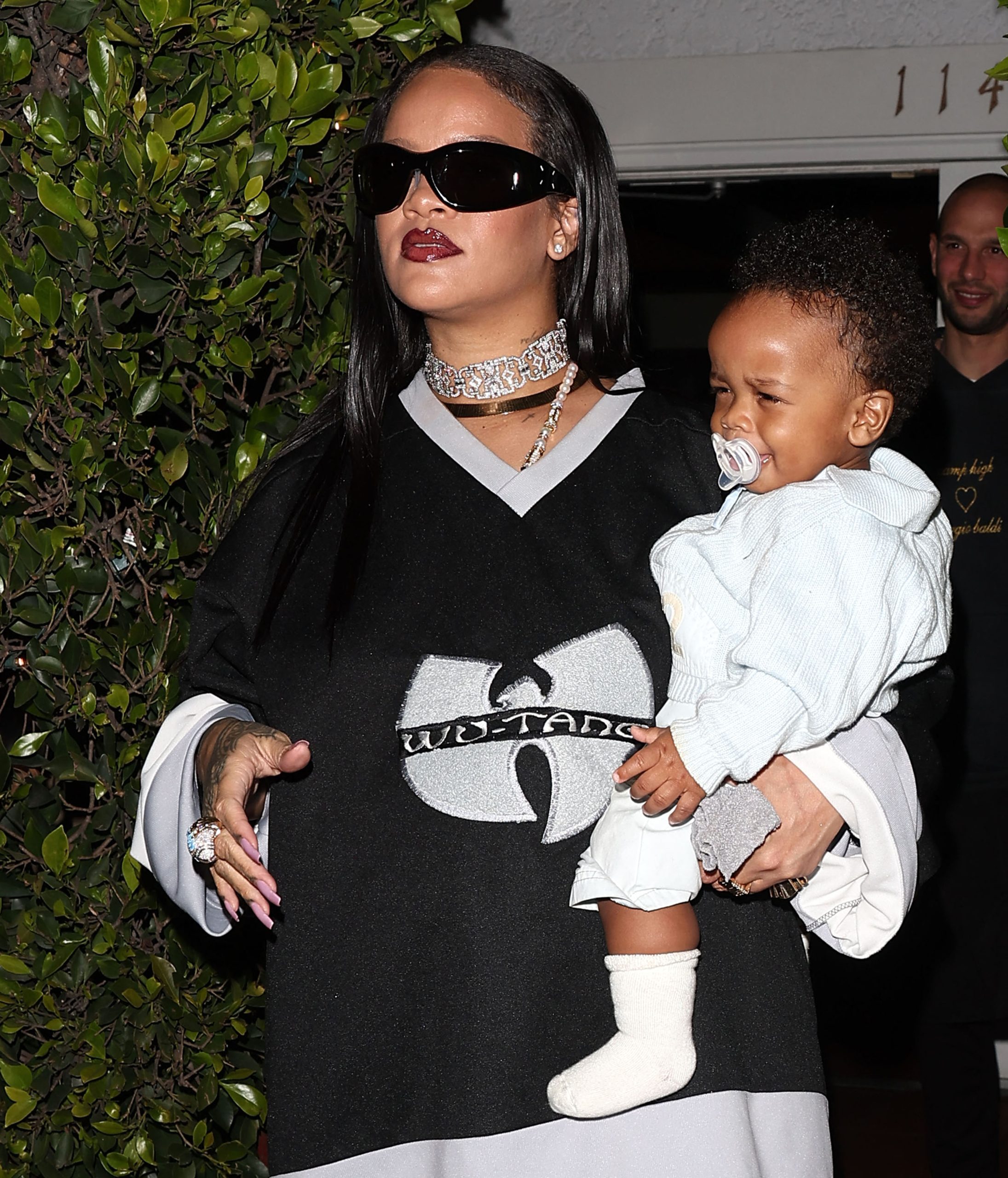 Rihanna Takes Maternity Fashion To The Next Level In Stunning Wu-Tang Shirt Dress, Shows Off Baby Bump