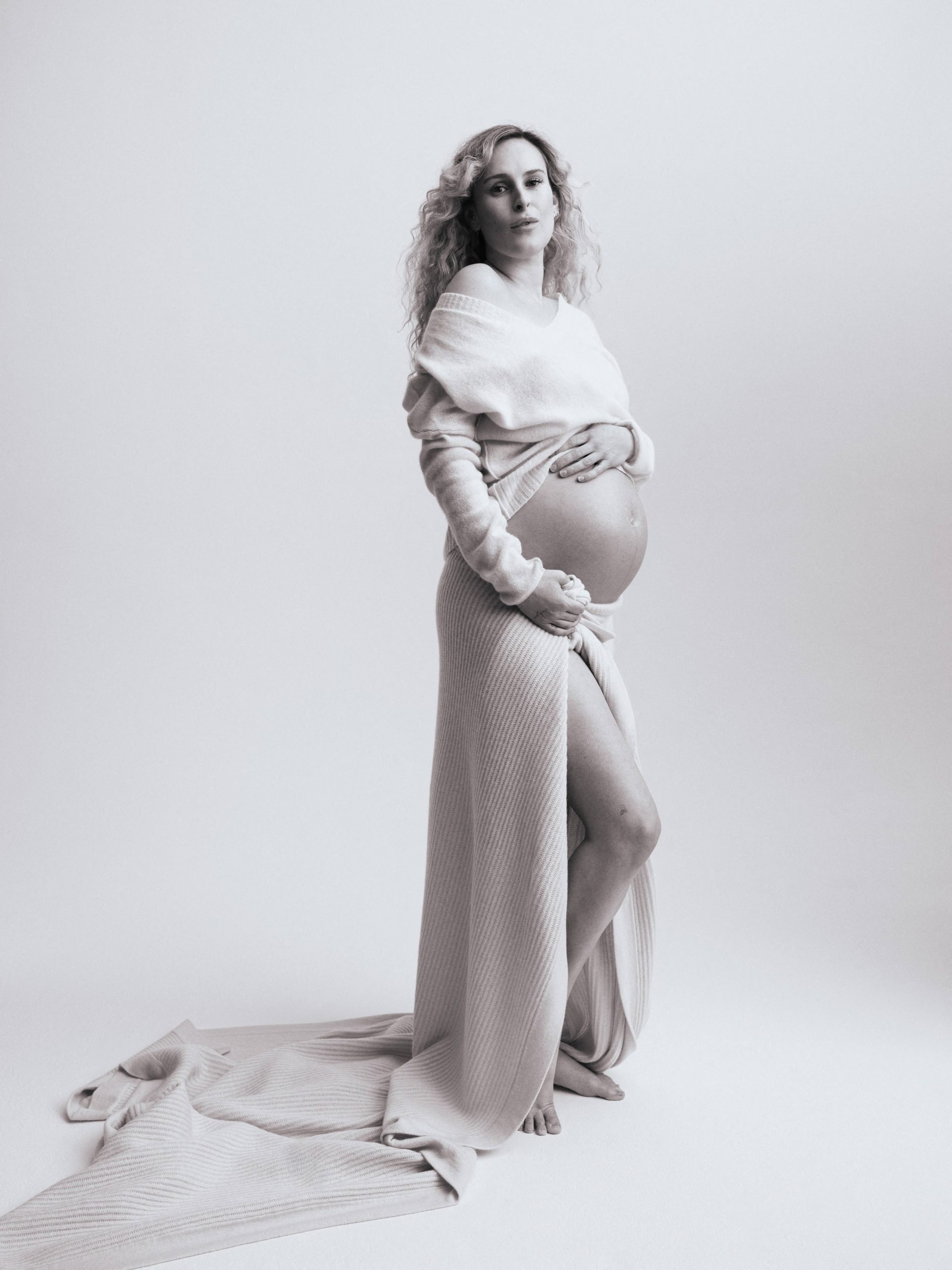 Rumer Willis shares baby bump as she poses for Naked Cashmere