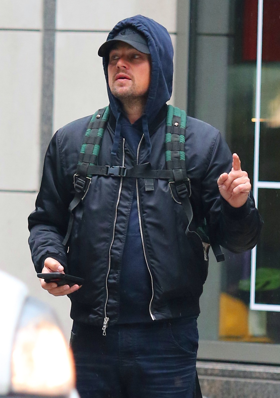 Leonardo DiCaprio helps out a lost tourist with directions in NYC