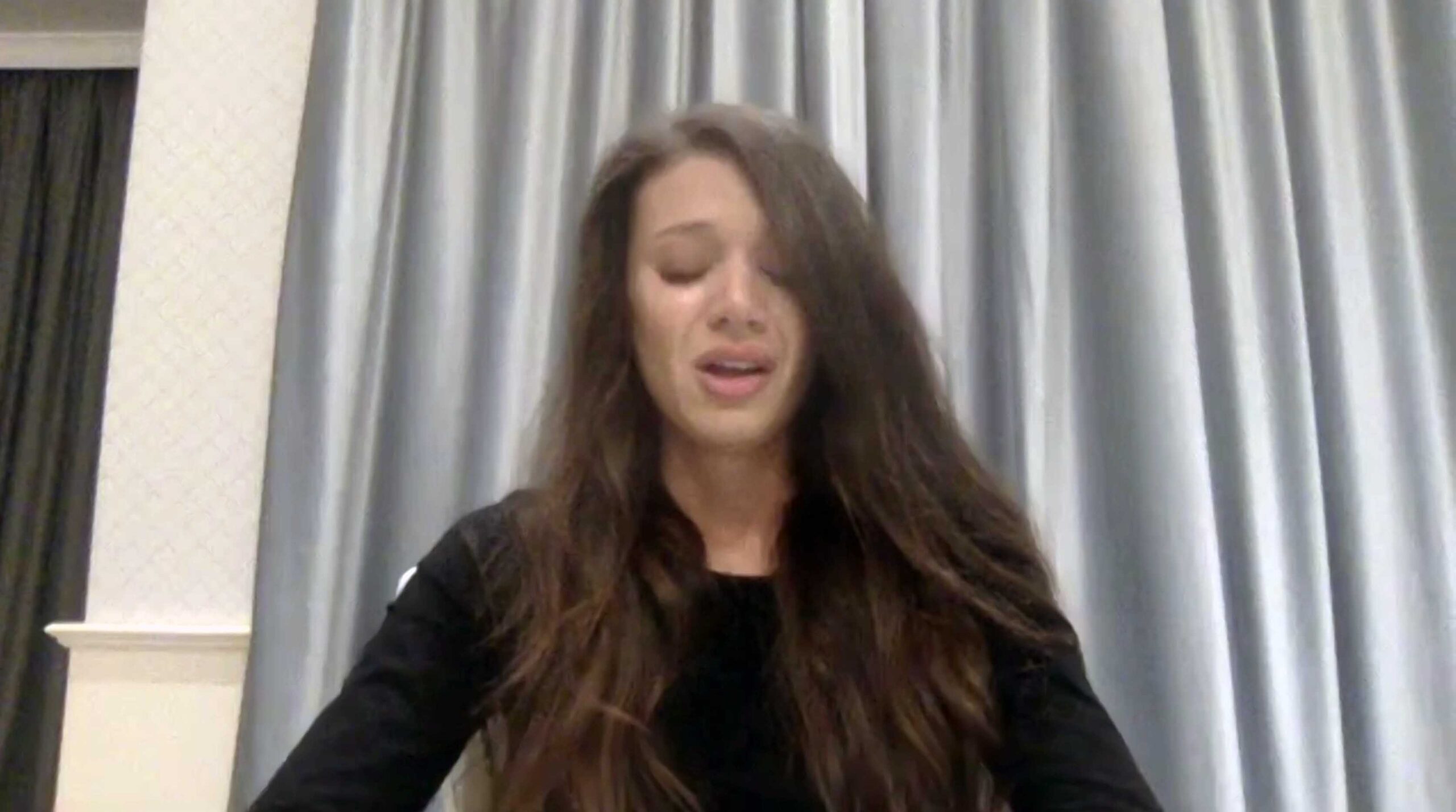 A woman who alleges that she was victimized by Hollywood actor Armie Hammer holds a press conference with her attorney Gloria Allred