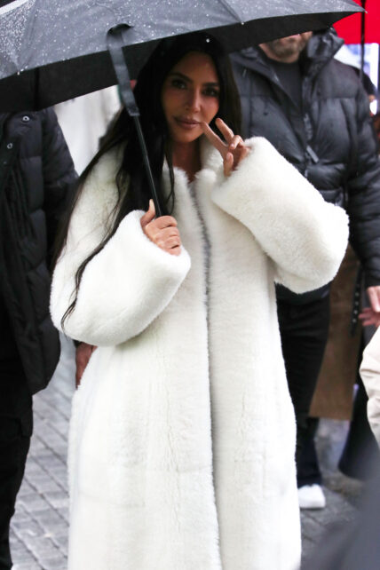 Kim Kardashian seen at a rainy London eye with her kids filming for her new tv series