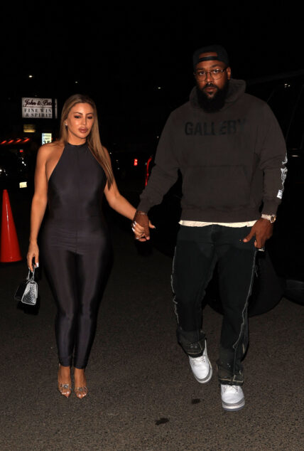 Larsa Pippen and Boyfriend Marcus Jordan walk hand-in-hand as they arrive for dinner at Catch Steak LA