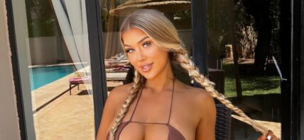 Eve Gale Tugs On Her Braids In Her Itty Bitty Bikini