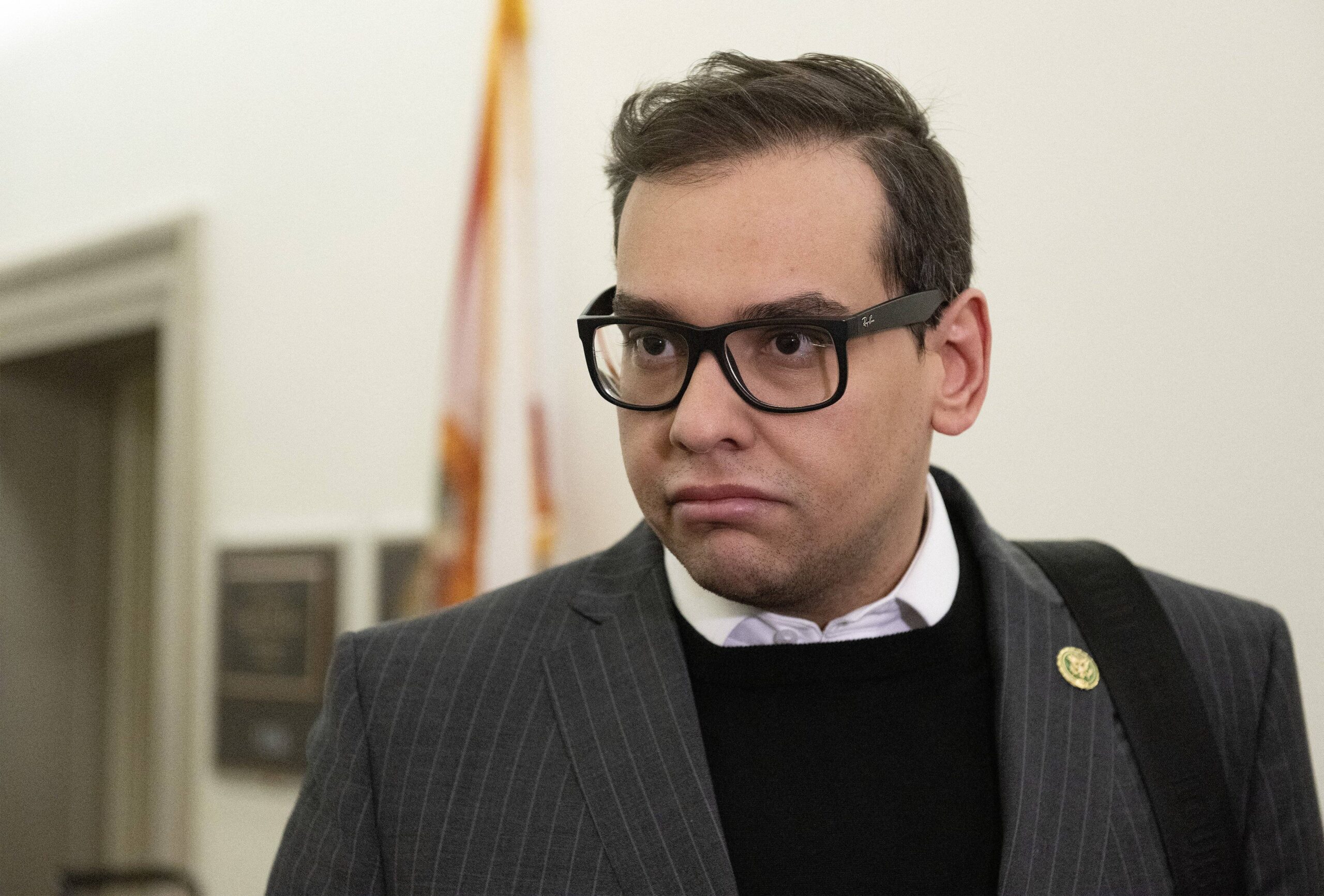 United States Representative George Santos (Republican of New York) speaks to a reporter as he arrives at his Capitol Hill office in Washington, DC