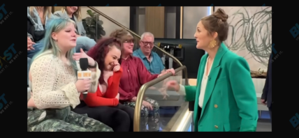 Drew Barrymore comforts an audience member