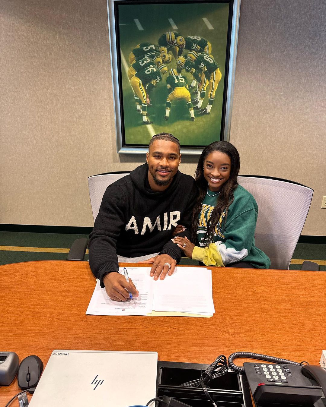 Simone Biles celebrates as Jonathan Owens joins Green Bay Packers