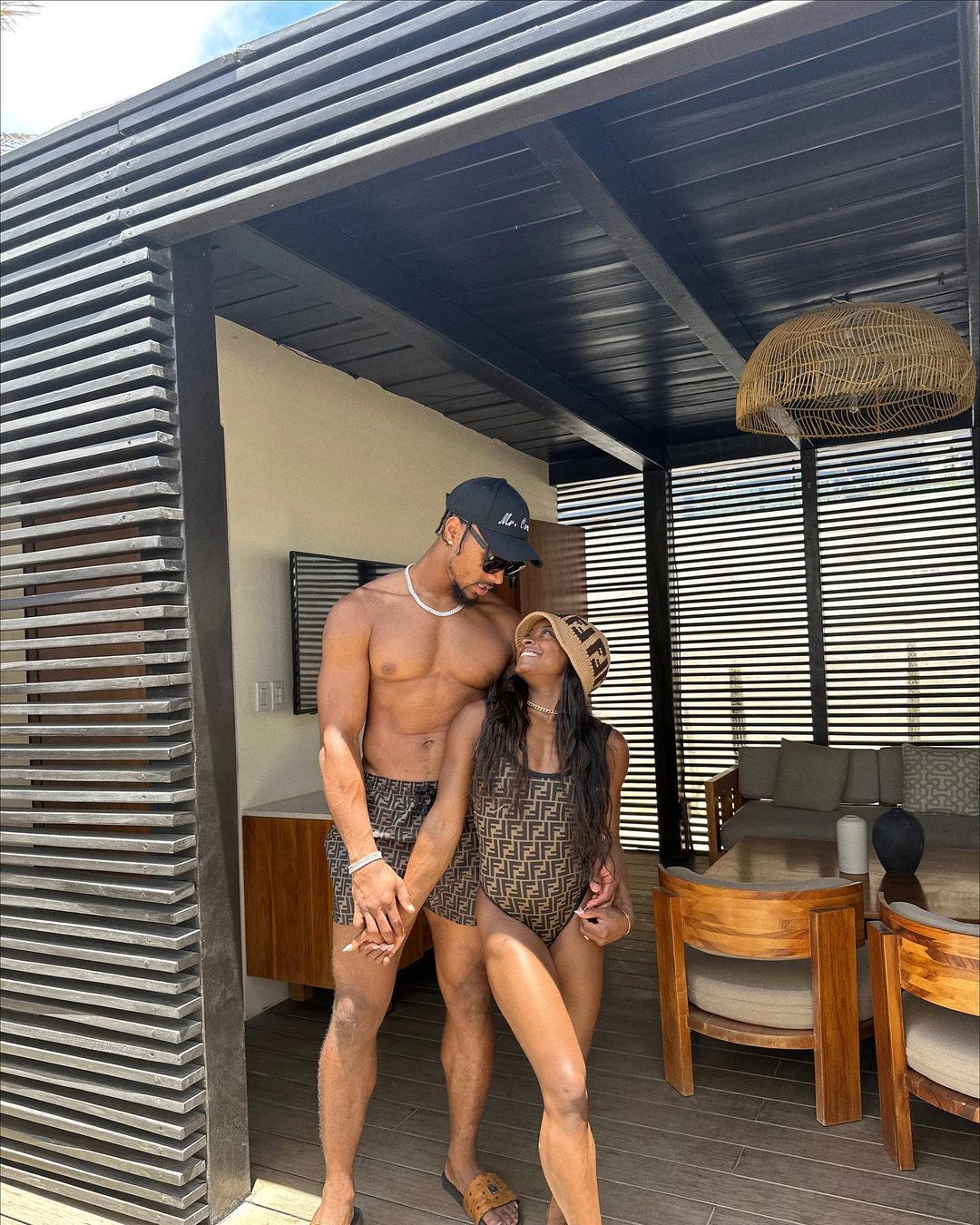 Simone Biles and husband Jonathan Owens in matching swimsuits