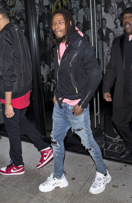 Rapper Fetty Wap was seen showing off his diamond encrusted Gold necklace as he was seen leaving dinner at apos Catch LA apos in West Hollywood CA