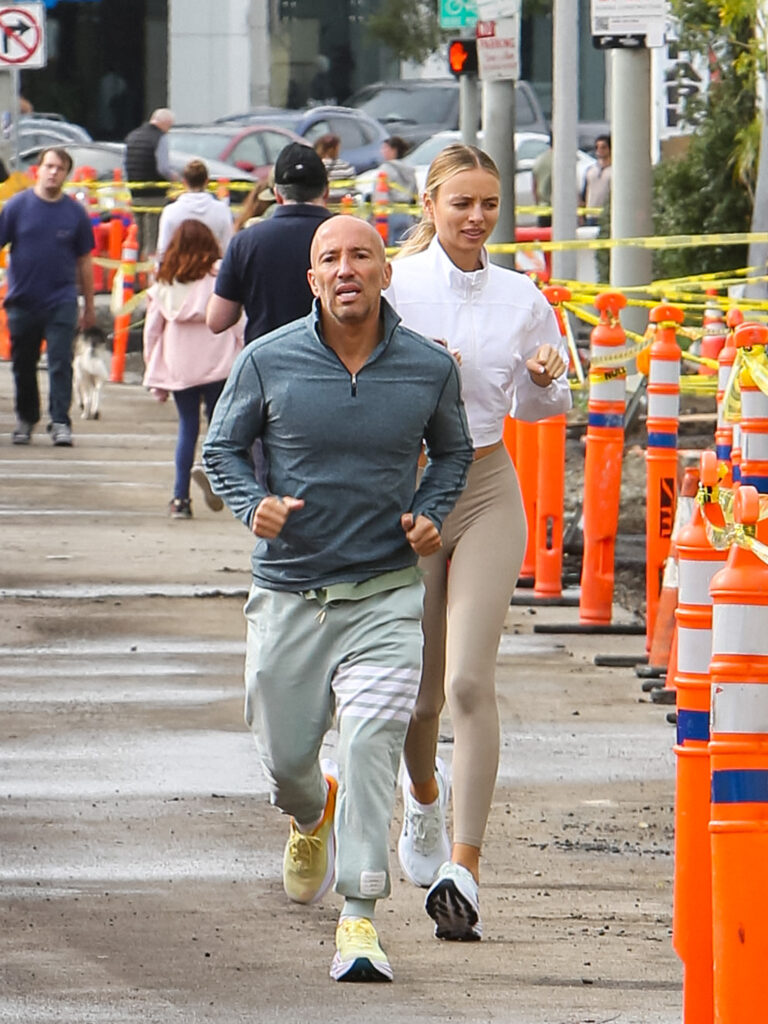 Jason Oppenheim and Marie-Lou Nurk jogging in West Hollywood