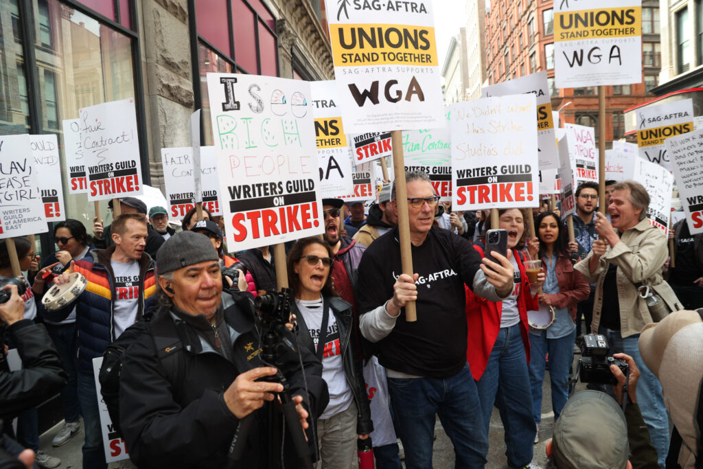 WGA Writers seen picketing in New York City for the Hollywood Strike in hopes to get better wages