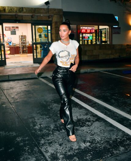 Kim Kardashian wears a special Jack Nicholson Lakers t shirt as she is happy after watching them win to get to the Western Conference Finals as she leaves a gas station in LA