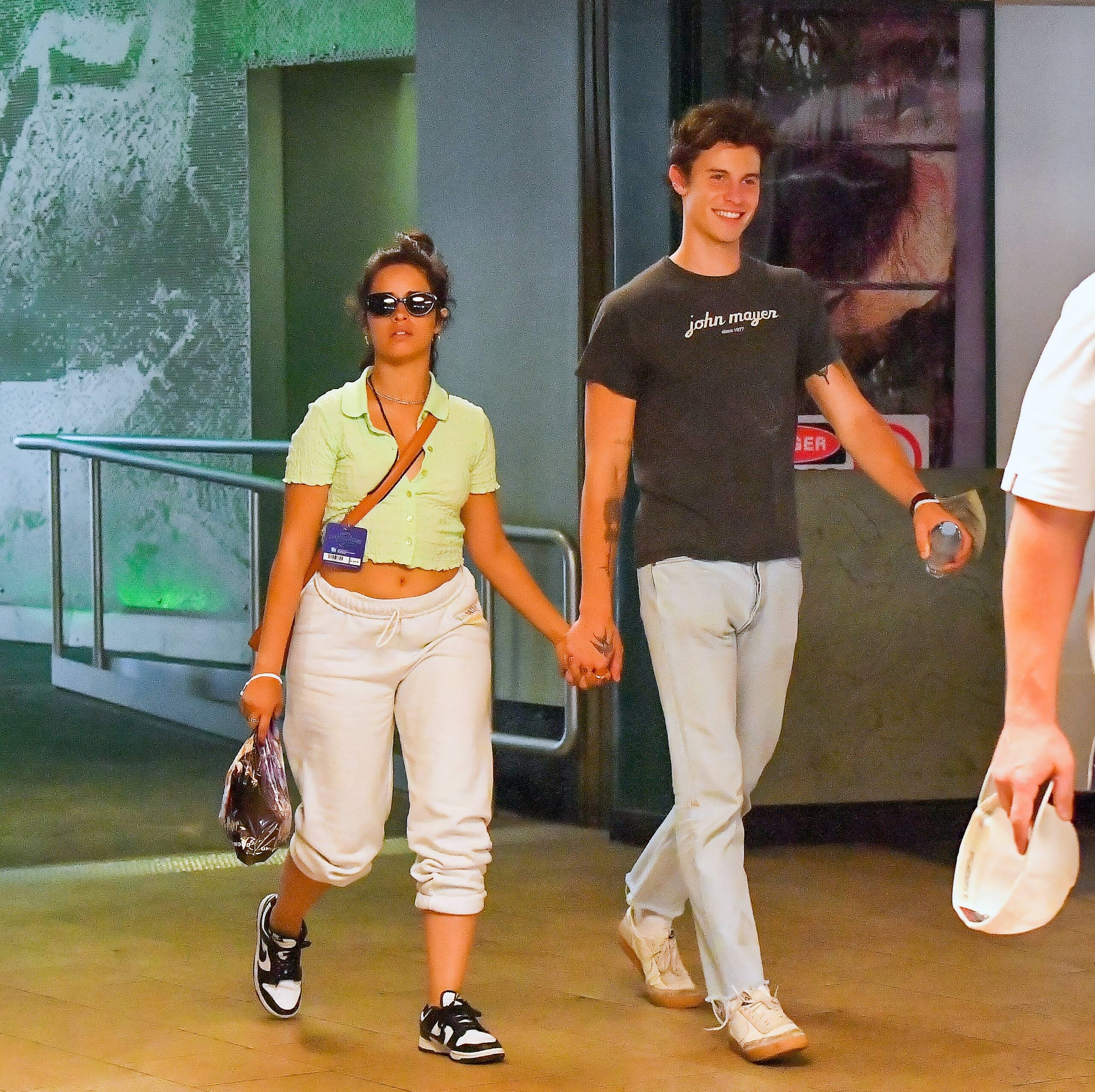 Shawn Mendes and Camilla Cabello hold hands as they enjoy a romantic day out at Universal Studios Hollywood