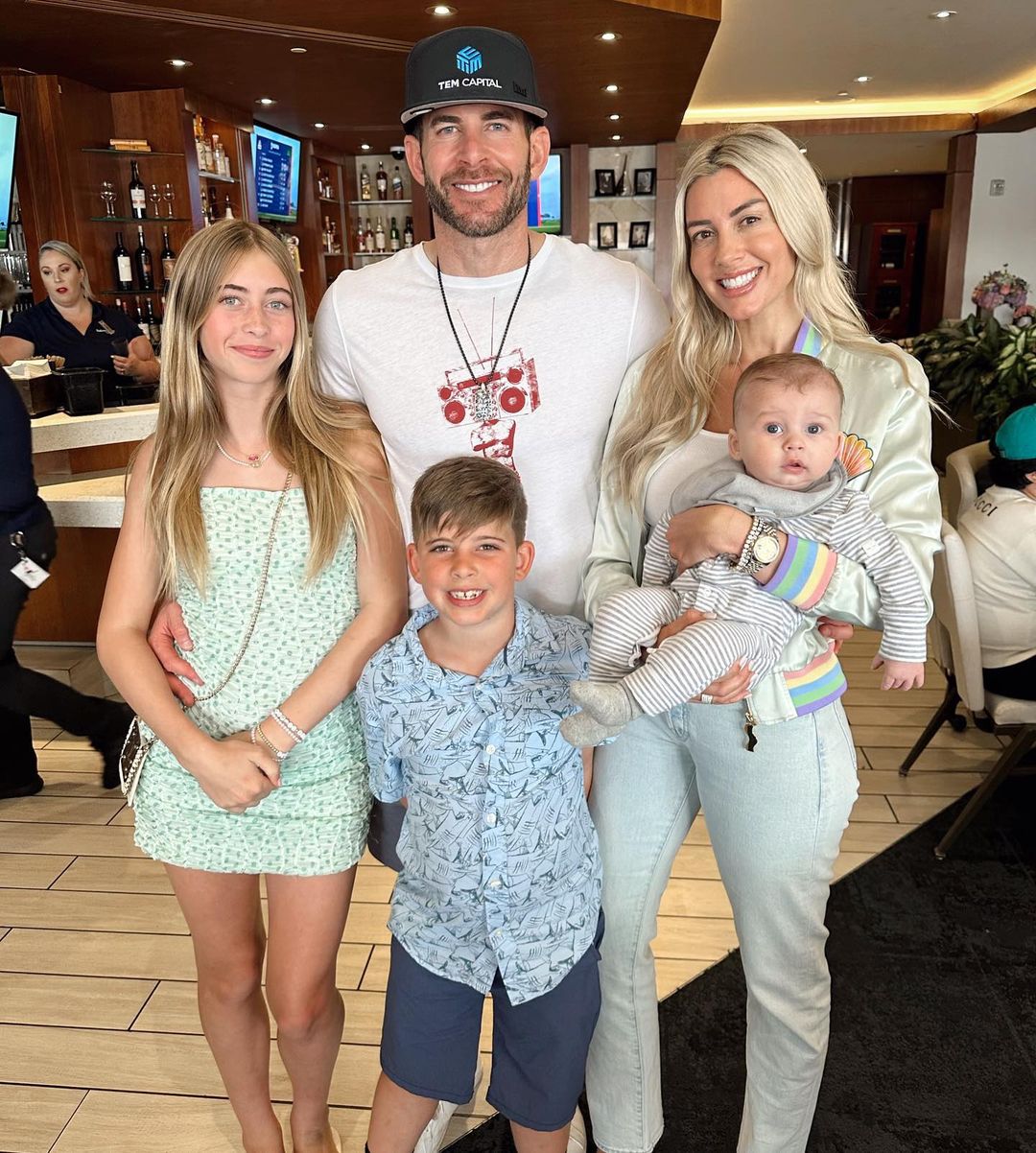 Tarek & Heather Rae El Moussa Celebrate Son Tristan's First Feature In Full Family Portrait