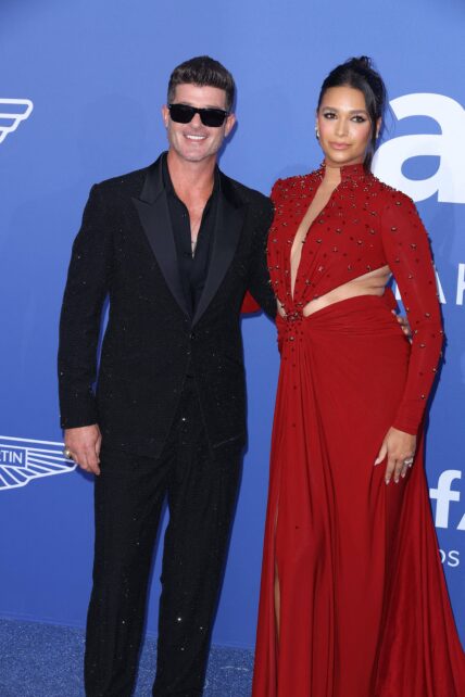April Love Geary and Robin Thicke at The amfAR Cannes Gala 2023 at Hotel du Cap-Eden-Roc