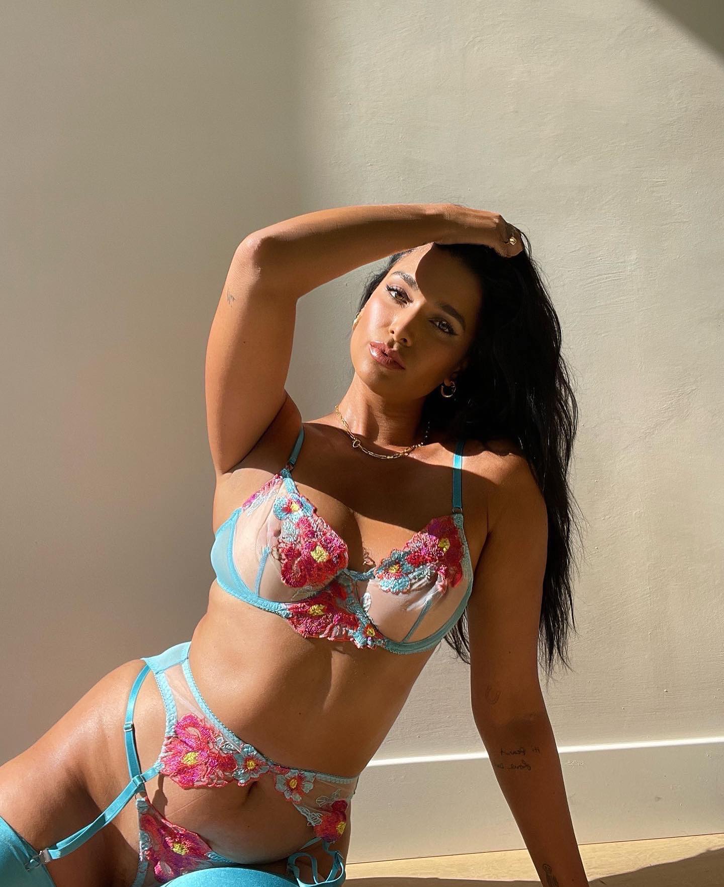 April Love Geary poses in lingerie