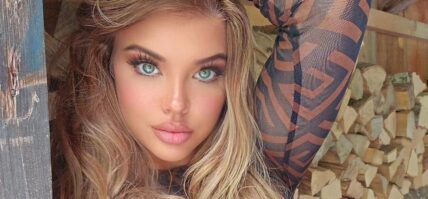 Dana Hamm poses in leather pants