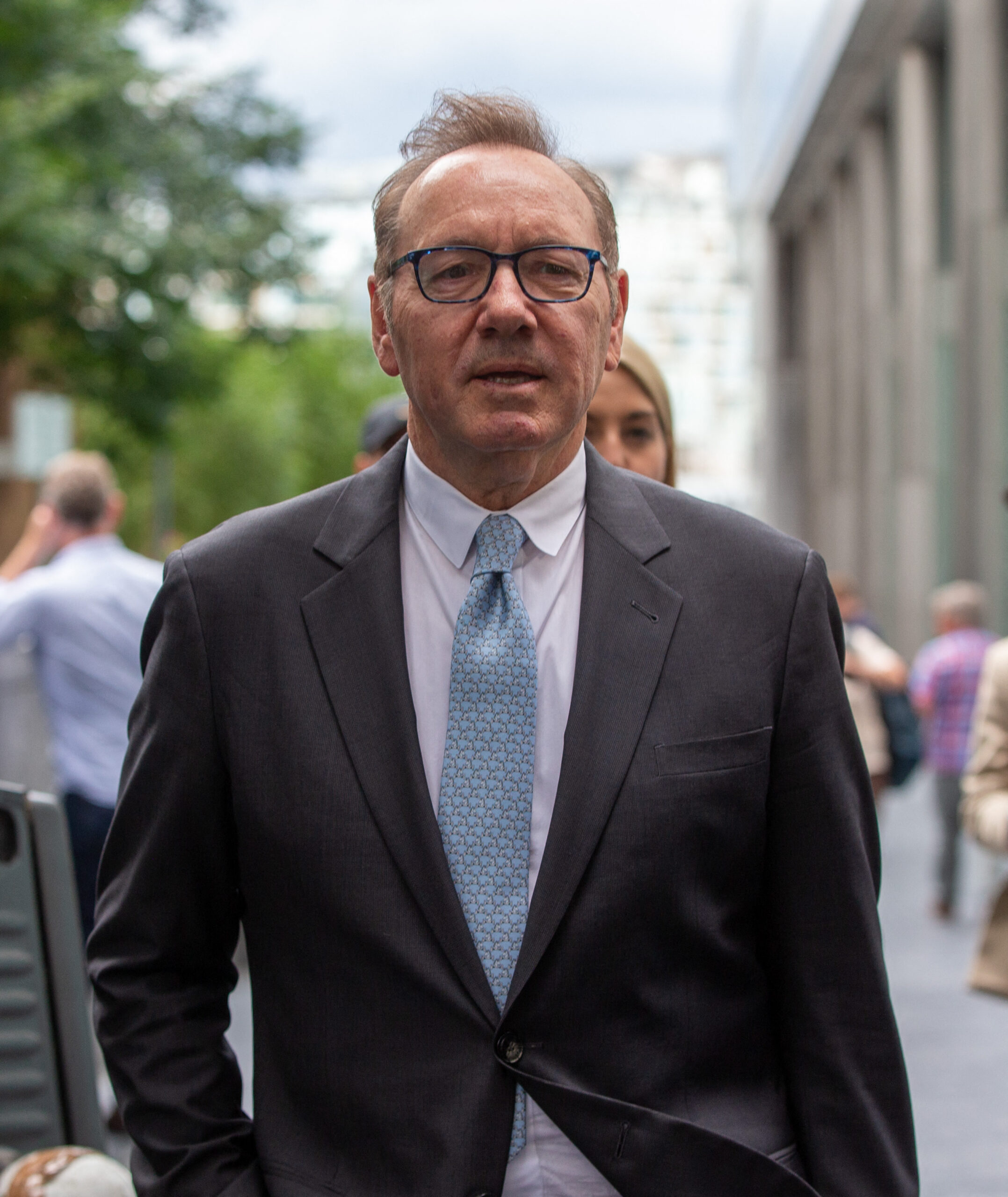 Kevin Spacey leaves London court after starting giving evidence at trial over sex offence charges