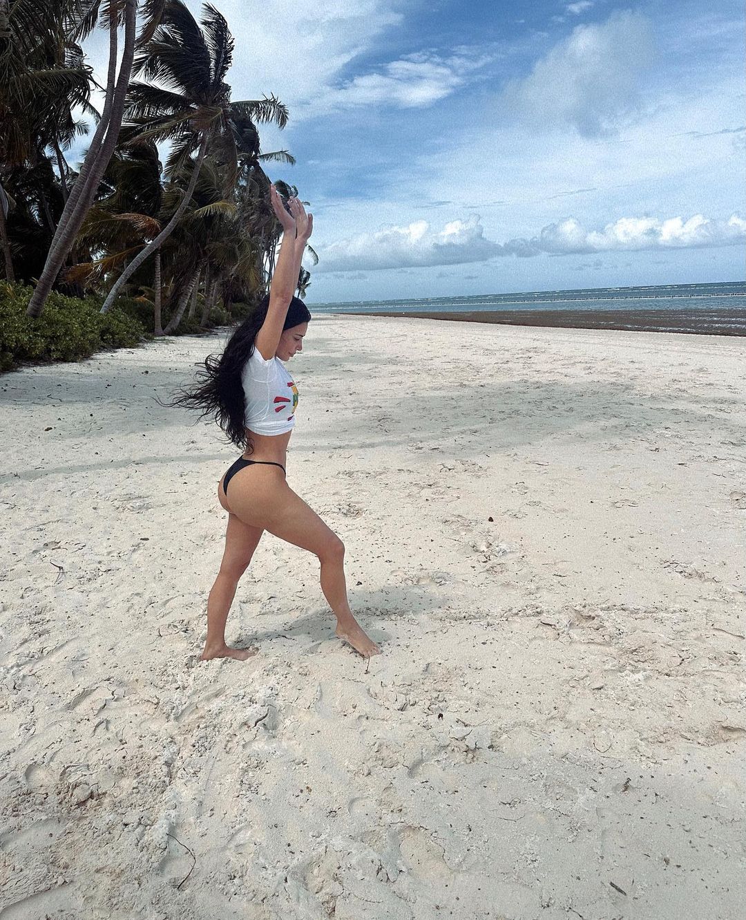 Billionaire Kim Kardashian Does A Cartwheel In A Thong On The Beach 