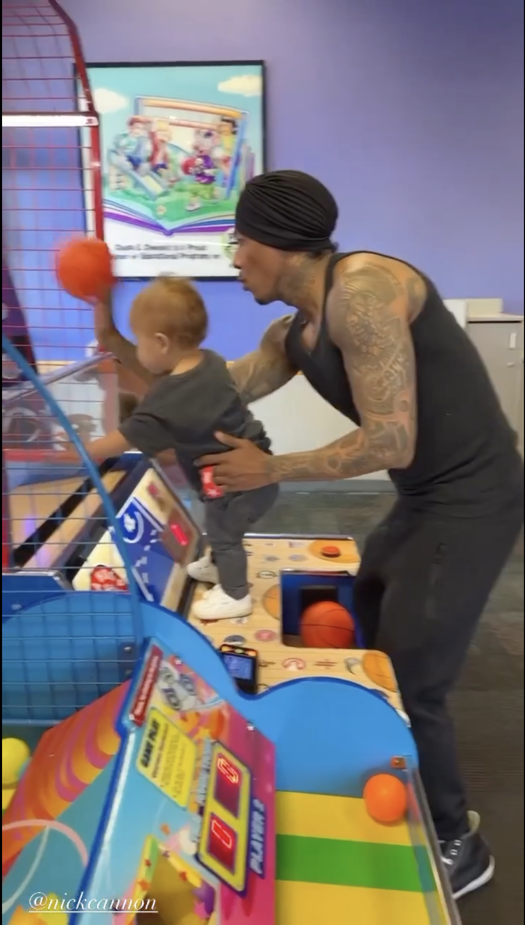 Nick Cannon and son bond at Chuck E. Cheese