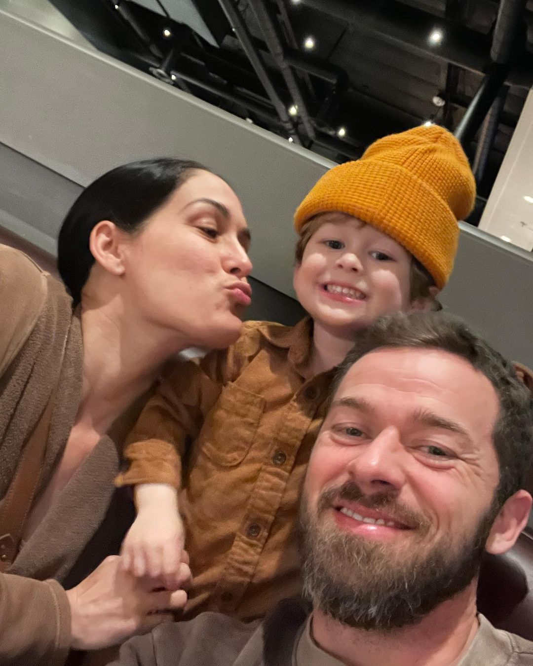 Nikki Bella and Artem Chigvinstev with son Matteo