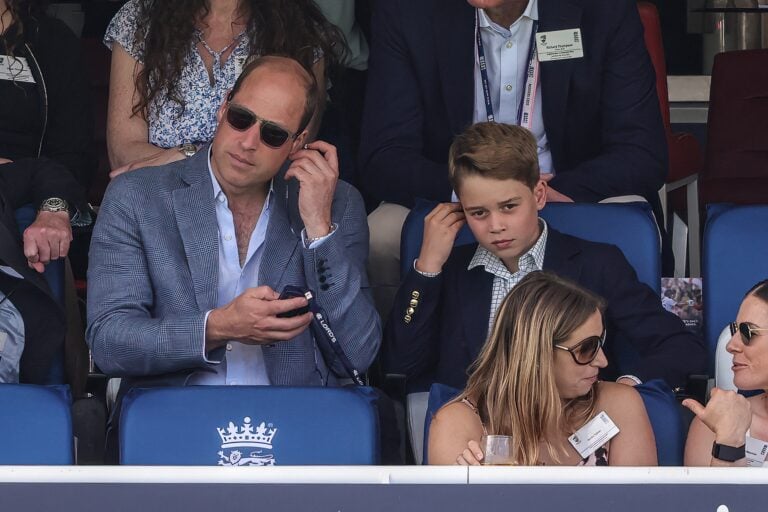 Prince William, Prince of Wales and Prince George of Wales celebrate the wicket of Pat Cummings of Australia during the LV= Insurance Ashes Test Series Second Test Day 4 England v Australia at Lords, London, United Kingdom,
