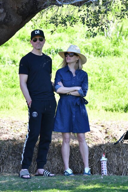 Reese Witherspoon and Jim Toth take their son to a soccer practice.