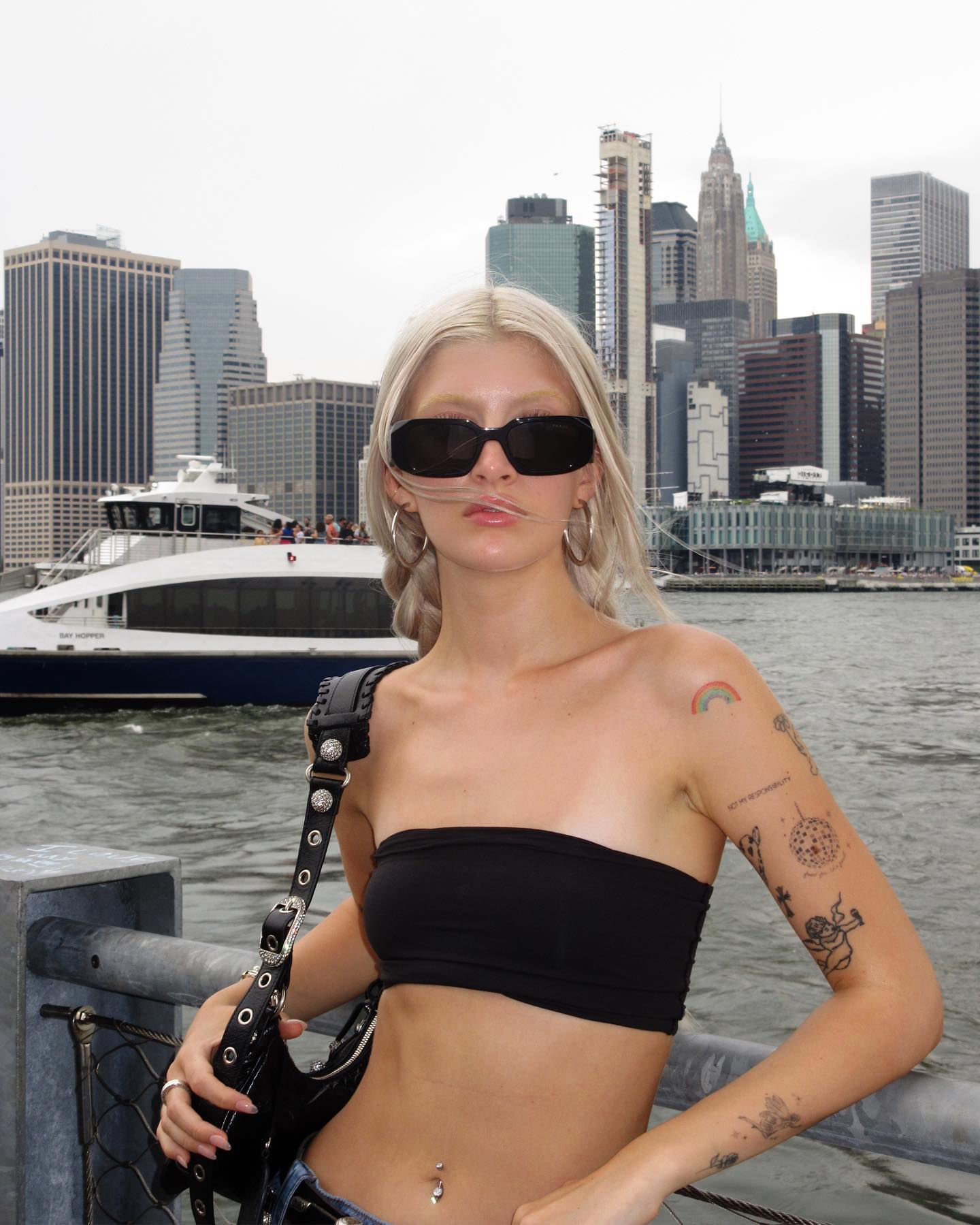 Sami Sheen In Bandeau Top Teases Toned Abs and Bleached Eyebrows