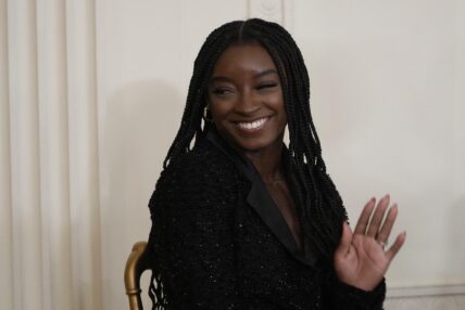 Gymnast Simone Biles listens prior to accepting the Medal of Freedom from United States President Joe Biden during a ceremony in the East Room of the White House in Washington, DC on Thursday, July 7, 2022. Credit: Chris Kleponis / CNP. 07 Jul 2022 Pictured: Gymnast Simone Biles smiles prior to accepting the Medal of Freedom from United States President Joe Biden during a ceremony in the East Room of the White House in Washington, DC on Thursday, July 7, 2022.