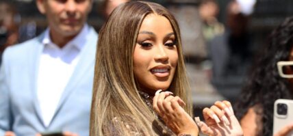 Cardi B yeets mic at an unruly fan