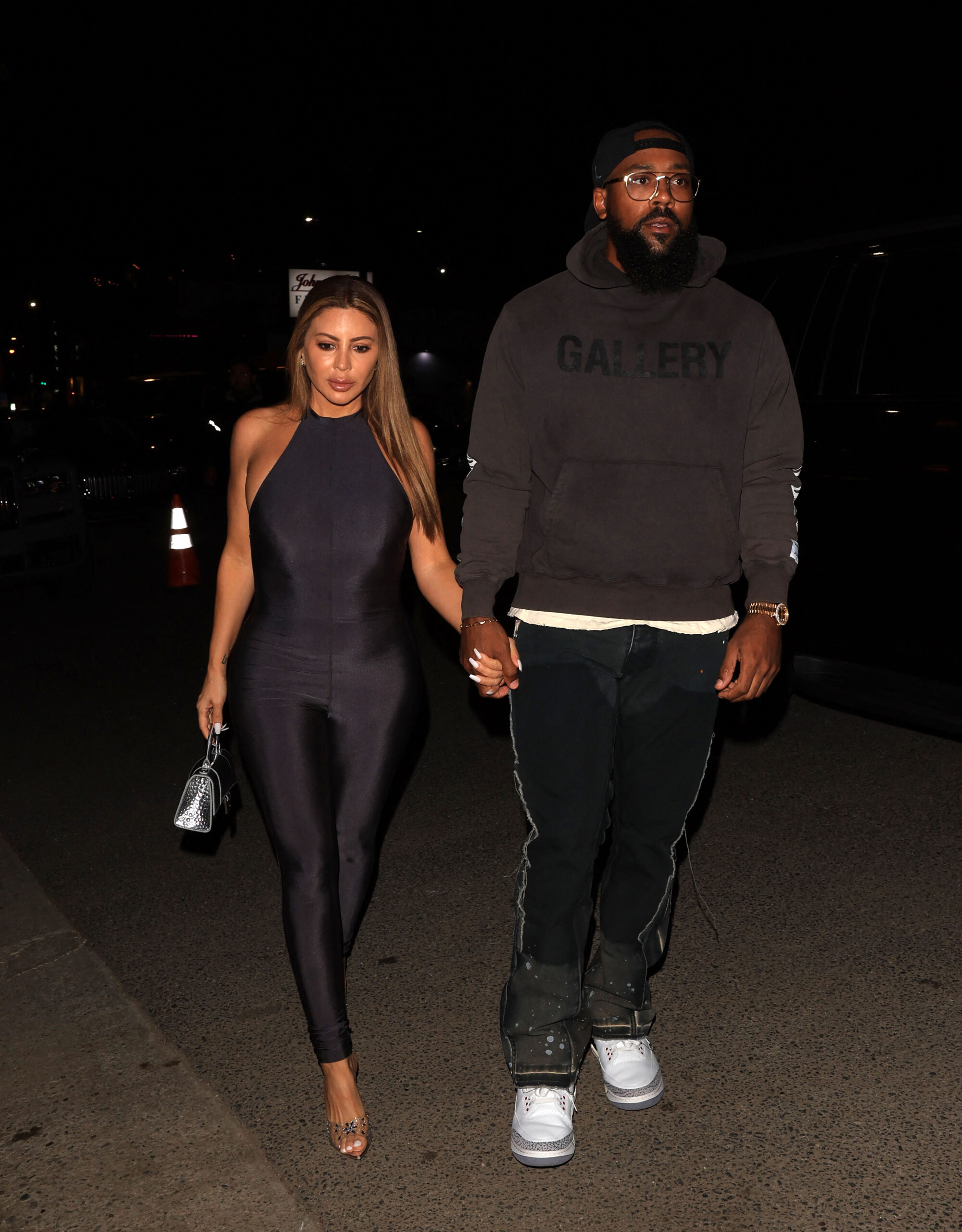Larsa Pippen and Boyfriend Marcus Jordan walk hand-in-hand as they arrive for dinner at Catch Steak LA
