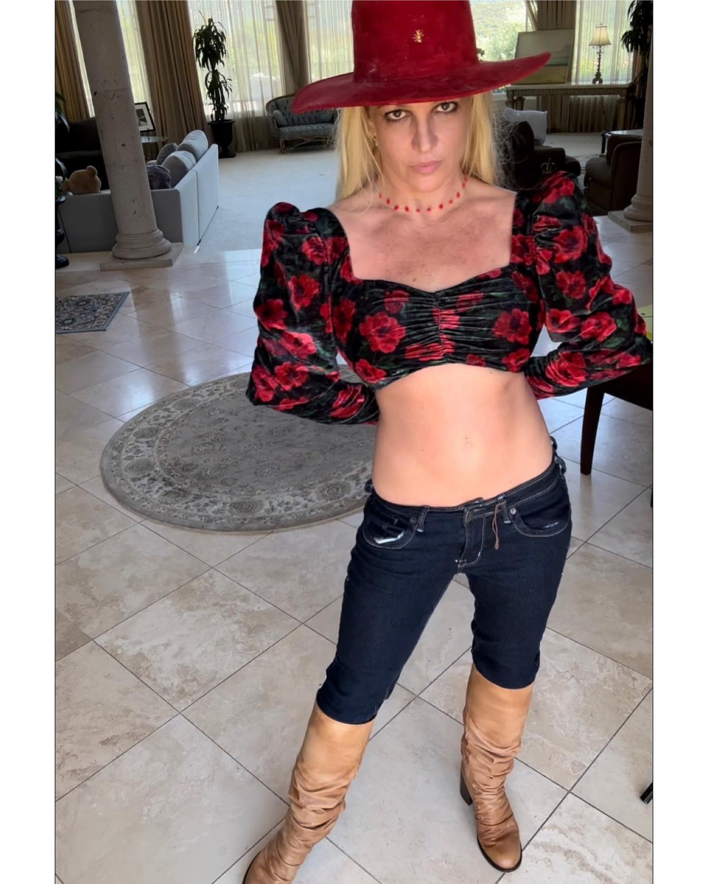 Britney Spears Bares Her Midriff In A Crop Top, Cowboy Hat & Boots
