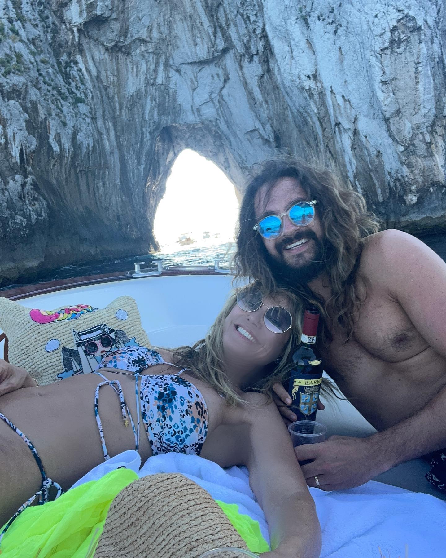 Heidi Klum in bikini and Tom Kaulitz in Capri