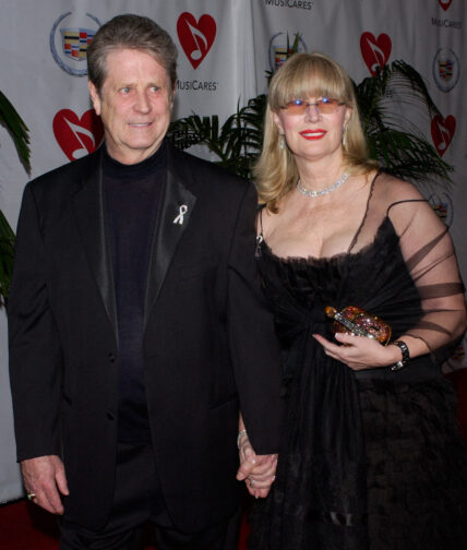 Brian Wilson and Melinda Kae Ledbetter arrive for the Musicares 2005 Person of the Year Tribute dinner honoring Wilson at the Paladium in the Hollywood section of Los Angeles, California February 11, 2005.
