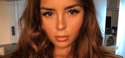 Demi Rose takes a selfie.