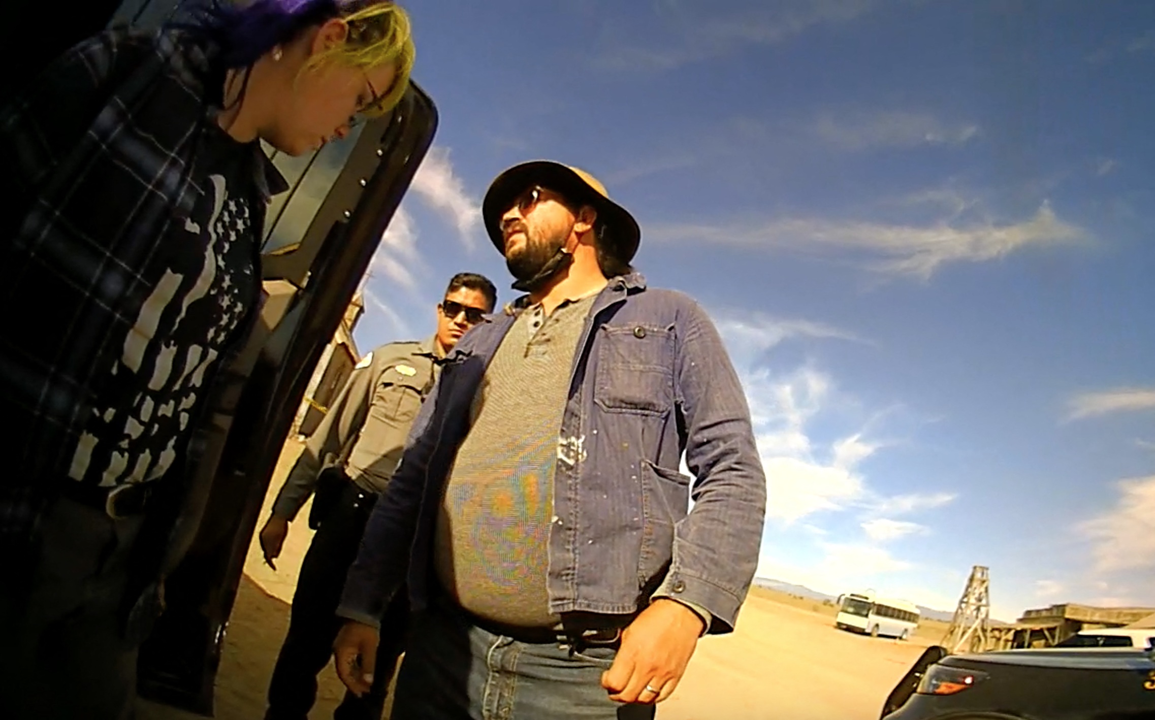 Hannah Gutierrez-Reed, the armourer on the set of Alec Baldwin movie Rust, where cinematographer Halyna Hutchins was shot dead, appears in police bodycam footage taken shortly after the fatal shooting in October 2021. She can be seen talking to police and can be heard telling an officer: “I just f****d up my whole entire career.” Bodycam footage captured on the New Mexico set shows Gutierrez-Reed sitting in the back of a police car before being escorted to a toilet by a female officer. The footage begins with Gutierrez-Reed answering a different officer’s questions. Gutierrez-Reed - who was in charge of weapons and ammunition on the set - first confirmed her place of work before responding to a question about her job title. When asked by a cop: “What’s your place of employment?” she responded, “Here”. The officer then asked: “What’s your job?” to which Gutierrez-Reed replied, “I’m the armourer, or at least I was.” Shortly afterwards, a female cop approaches the car Gutierrez-Reed is sitting in, saying: “Hi, you need to use the restroom?” Gutierrez-Reed confirms that she does, and the pair start walking across the film’s set towards the toilets. Gutierrez-Reed can be heard saying: “Welcome to the worst day of my life”, before adding: “I can’t believe Alec Baldwin was holding the gun, that’s so f****d.” Once in the bathroom, Gutierrez-Reed states: “I just want to get the f**k out of here and never show my face in this industry again. “I'm the only female armourer in the game and I just f****d up my whole entire career." She later refers to herself as a "f*****g failure." Files related to the ongoing investigation were released by Santa Fe County Sheriff's Office earlier this week. 27 Apr 2022 Pictured: Hannah Gutierrez-Reed, the armourer on the set of movie Rust, seen in police bodycam footage. Photo credit: Santa Fe County Sheriff/MEGA TheMegaAgency.com +1 888 505 6342 (Mega Agency TagID: MEGA851773_010.jpg) [Photo via Mega Agency]