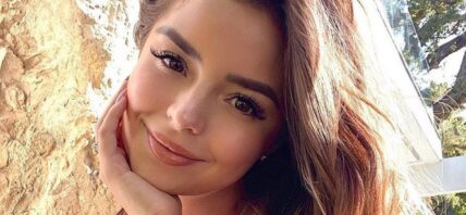 Demi Rose takes a selfie.