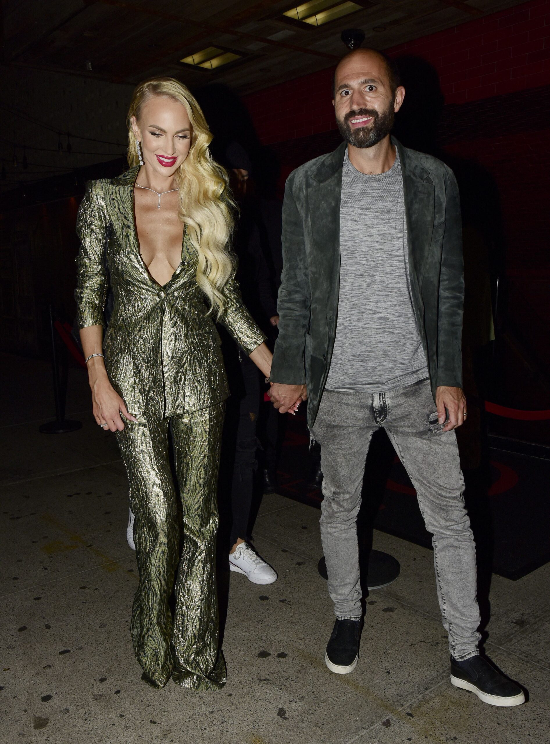 Christine Quinn and Christian Richard leave the TAO afterparty with husband Christian during fashion week NYC