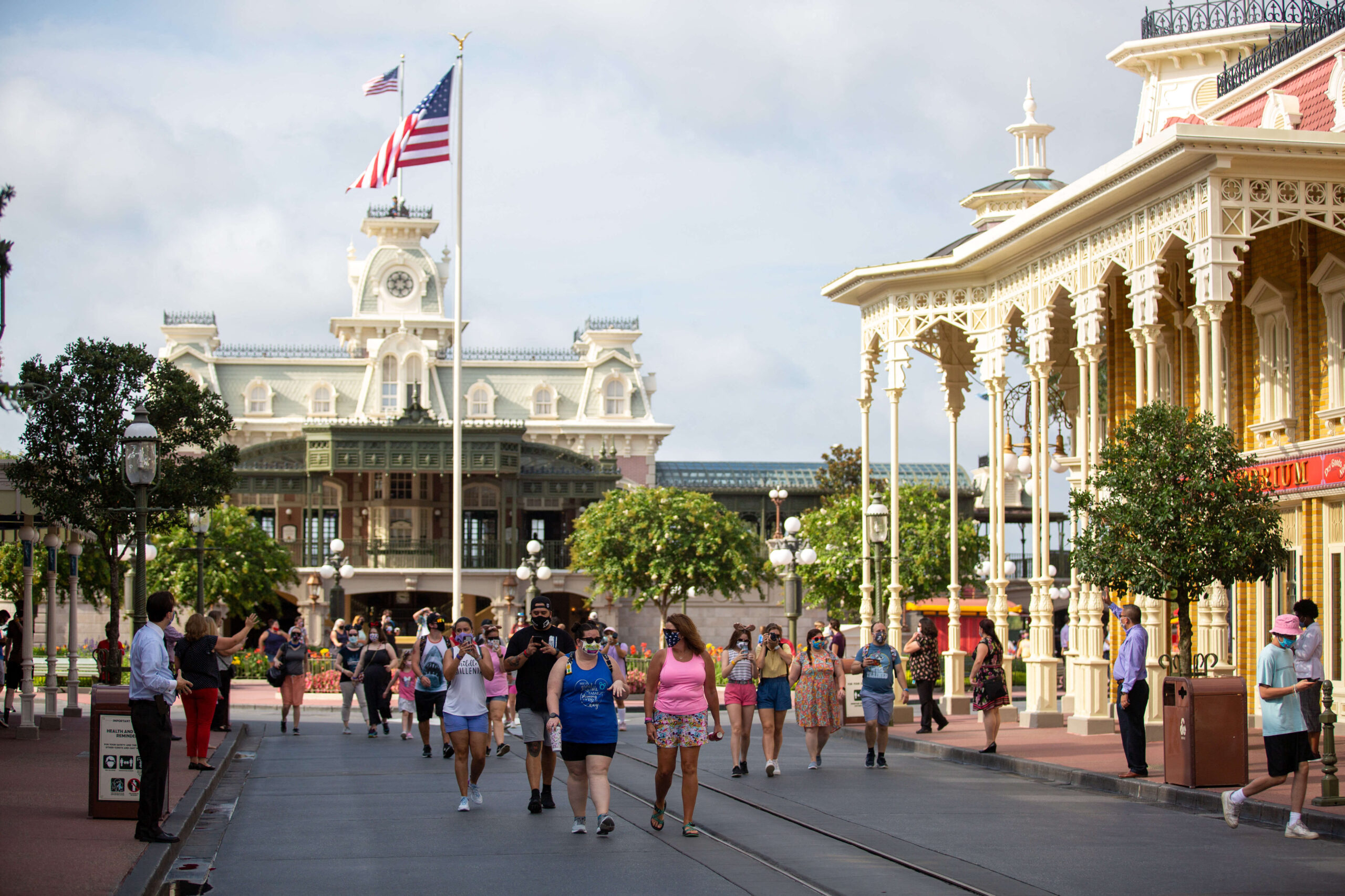 Guests walk down Main Street U.S.A. in Magic Kingdom