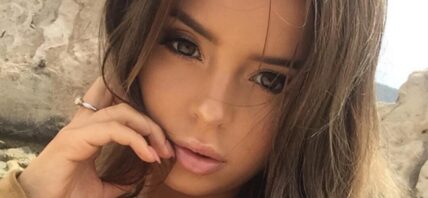 Demi Rose takes a selfie.