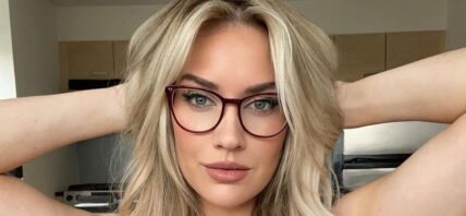 Paige Spiranac poses for the camera.