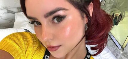 Demi Rose takes a selfie.