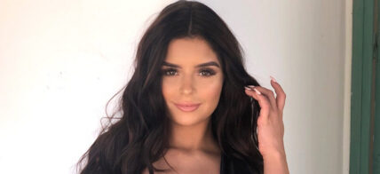 Demi Rose poses for the camera.