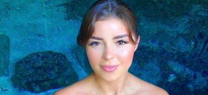 Demi Rose poses for the camera.