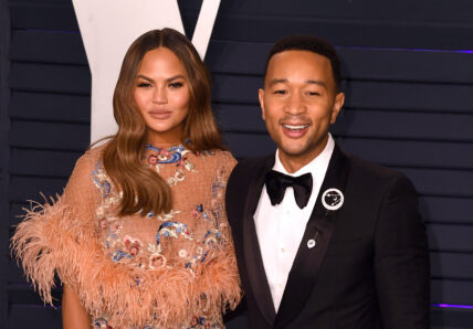 Chrissy Teigen and John Legend arrive at Vanity Fair Oscar Party