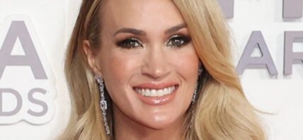 Carrie Underwood smiles at an event