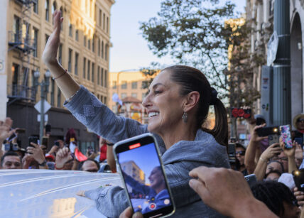 Claudia Sheinbaum waves during Rally in LA