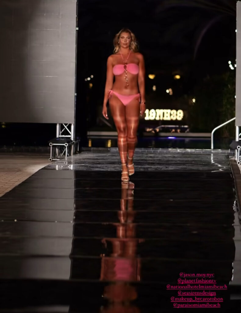 Andreea Dragoi walks the runway at Miami Swim Week.