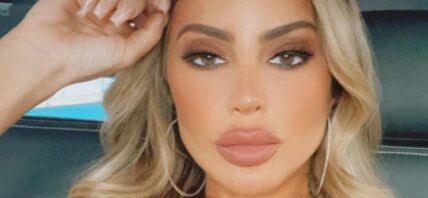Larsa Pippen poses from a car
